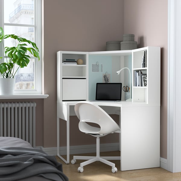 A white MICKE corner workstation