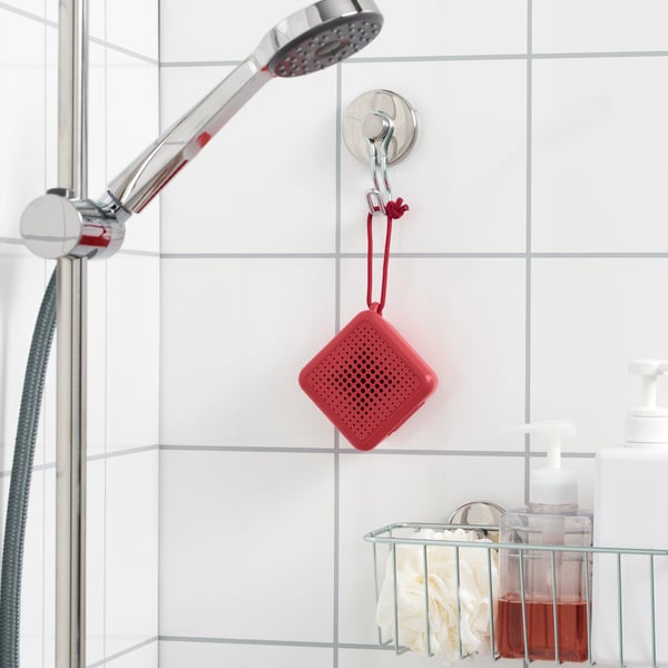 A waterproof red VAPPEBY portable bluetooth speaker