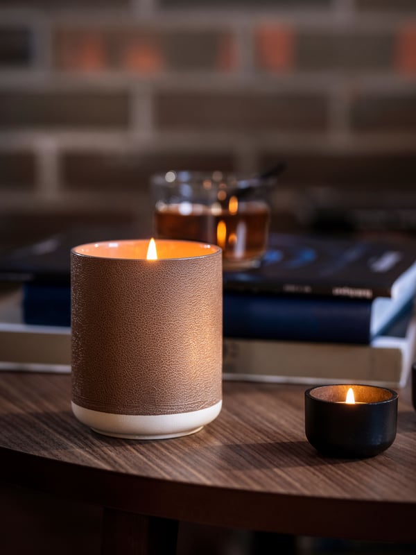 A black HEDERVÄRD tealight holder