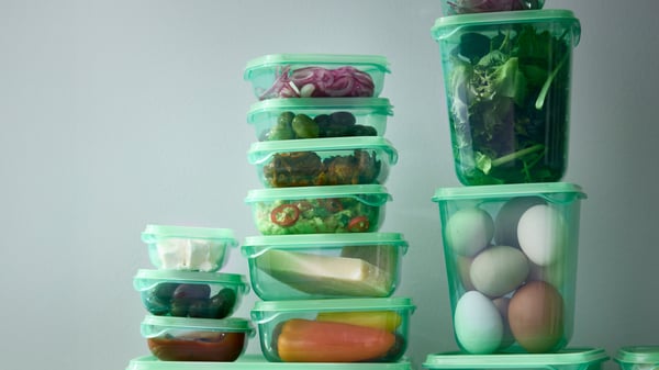 A green PRUTA food container with lid