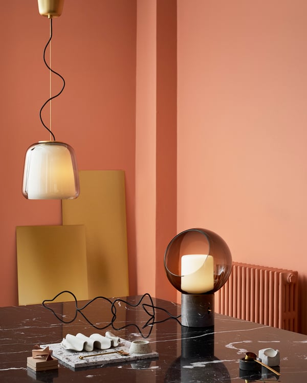A marble/grey globe EVEDAL table lamp