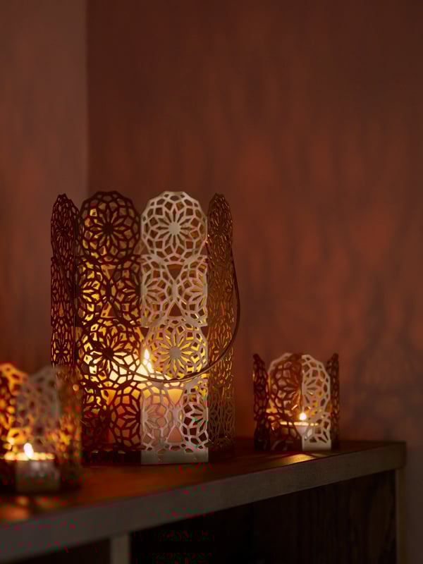 A gold-colour GOKVÄLLÅ lantern