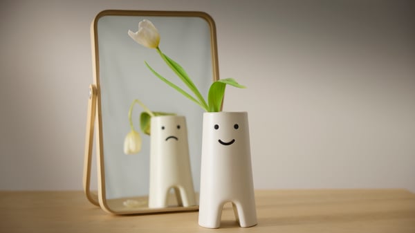 An ash IKORNNES table mirror